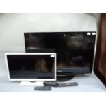 An LG flatscreen television, together with a white JVC television (2)