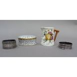 A Royal Worcester fruit decorated cream jug, a Herend hand painted trinket box of oval outline and