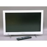 A white cased Sony Bravia television with remote control