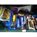 A quantity of model cars, trucks, trains, commercial vehicles, mostly in original boxes and
