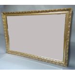 A reproduction gilt mirror with bevelled glass plate, 71cm x 101cm