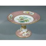 An English porcelain tatza of shaped circular design the centre painted with convolvulus within a