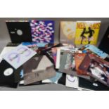 A record case including 12" singles New Order - Find Time, Missing Persons - Words, Mezzoforte -