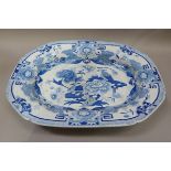 A 19th century patent Ironstone china meat plate printed in blue and white with a pattern of