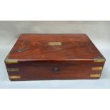 A 19th century mahogany and brass bound box with brass stringing and cartouche recessed handles