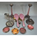 A pair of silver and pink enamel candlesticks, Birmingham 1929, together with a pair of silver and