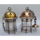 A early 20th century brass and opaque glass hall lantern the domed top with pierced decoration,