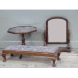 A Victorian mahogany dressing table mirror with arched plate supported on a pair of s-scroll