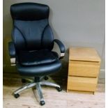 An executive type black faux leather and chrome swivel chair together with an oak veneered chest