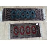 Two middle eastern prayer mats, 70cm x 30cm and 103cm x 31cm