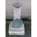A cast concrete sundial