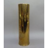 A brass shell case, 53cm high x 14cm diameter