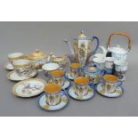 Oriental ceramics including, a Japanese part coffee service, part tea service, a tea kettle and four