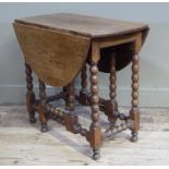 An oak gateleg table on bobbin turned legs, 82cm wide