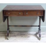 A mahogany sofa table