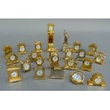 Twenty-three brass clock miniatures with quartz movements, novelty and others