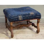 A French beech square stool the stuffed over top on acanthus scrolling molded legs joined by a