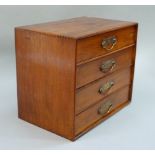 A mahogany four drawer cabinet, 37cm wide x 32cm high