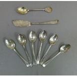 A set of six silver teaspoons, a golfing spoon engraved PGC and a butter knife, various dates and