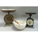 A pestle and mortar together with two vintage weighing scales