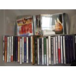 A quantity of CDs covering, Classical, Rat Pack, Shirley Bassey, Eric Clapton and others