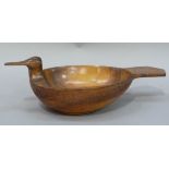 A Scandinavian skala in the form of a bird with typical chip carved decoration, 35cm wide