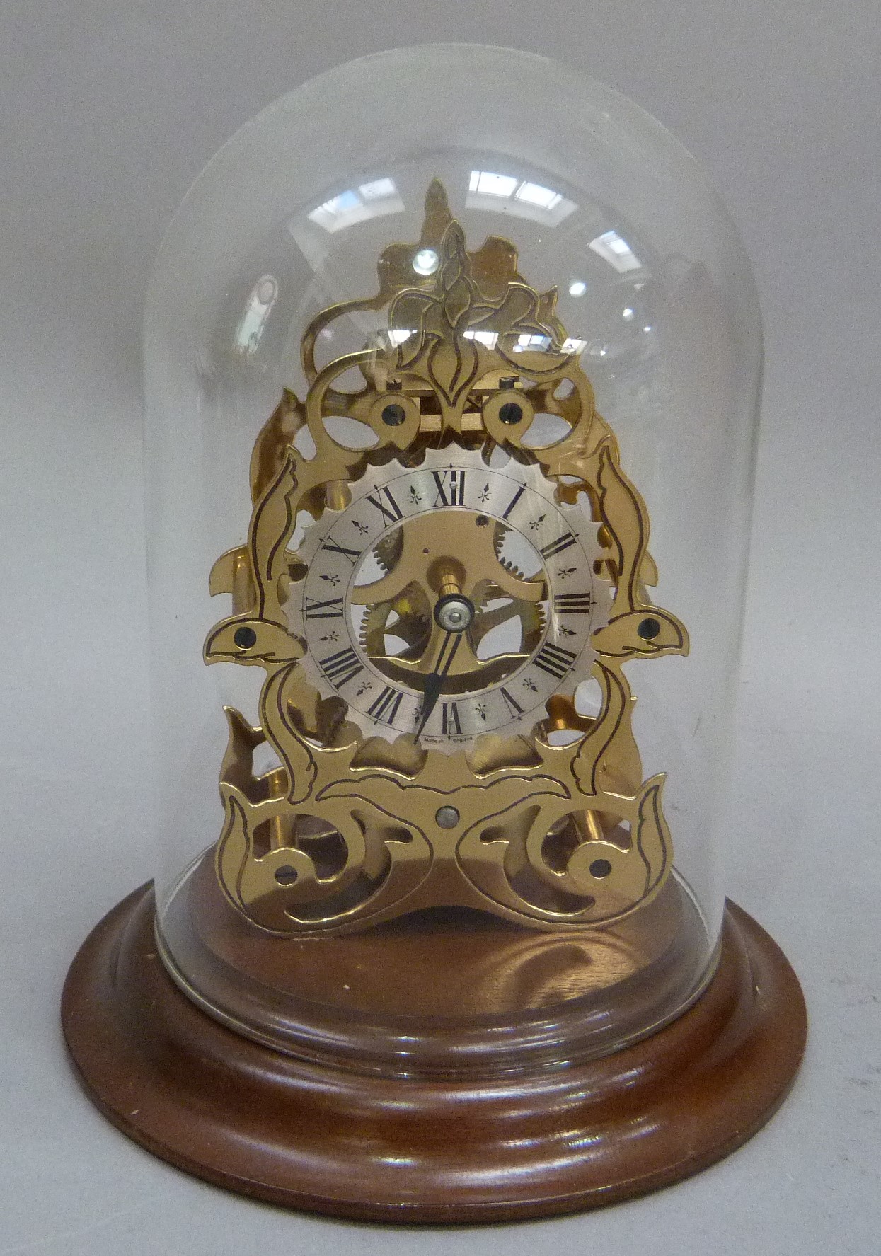 A reproduction skeleton clock with engraved brass plates, single train movement, the shaped silver - Image 2 of 3