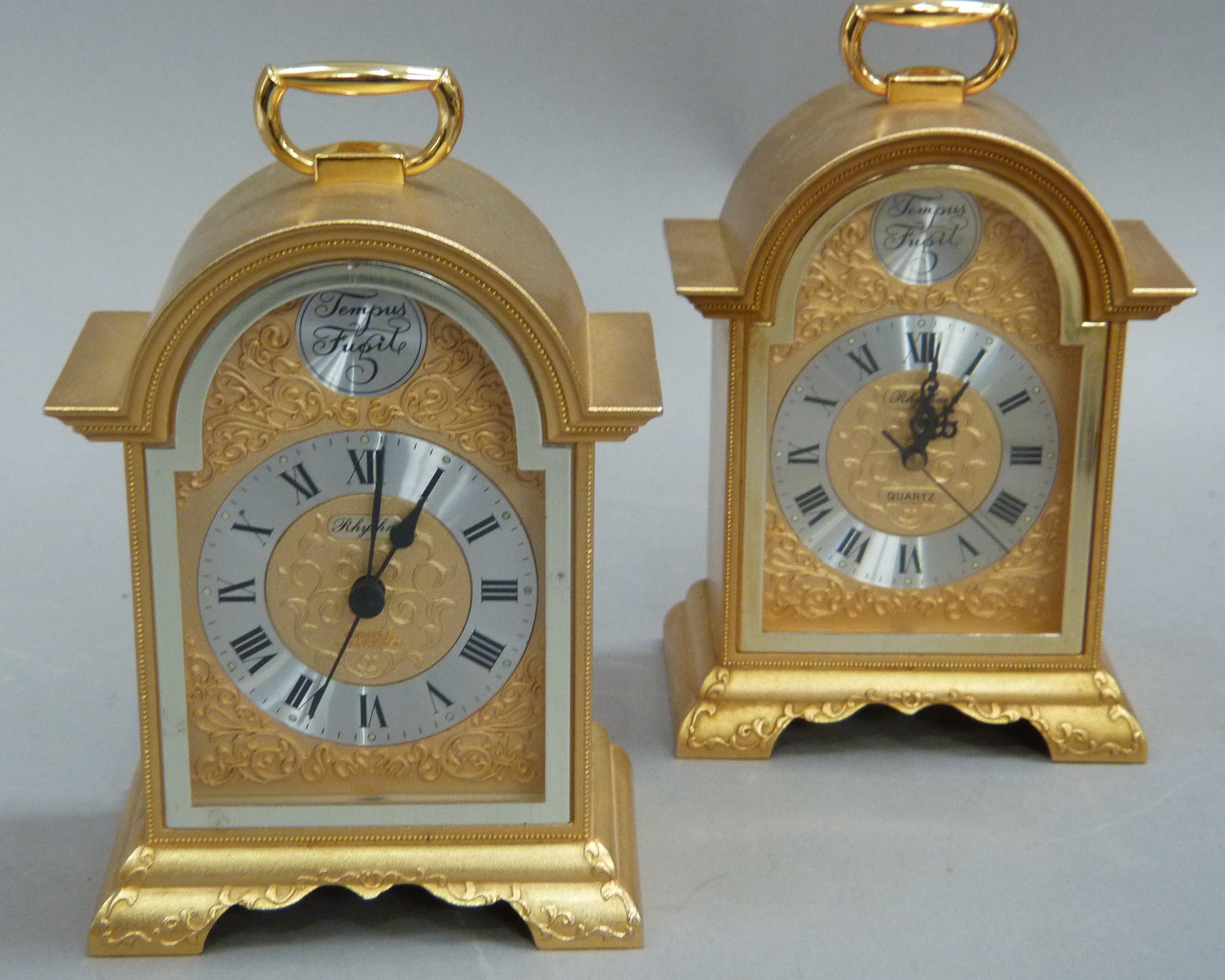 Two Rhythm Georgian style gilt metal bracket clocks with four jewel transistor quartz movements,