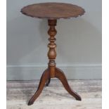 A Victorian mahogany tripod table