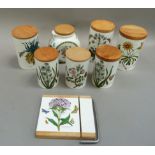 Six Portmeirion botanic garden storage jars, three large and three medium with wooden lids, together