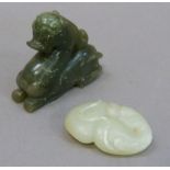 Two jadeite carvings of a dragon and an insect sitting upon a peach, dragon 6cm x 5.5cm, insect