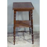 A square two tier table the top with dog tooth rim above an undertier and H-stretcher turned legs,