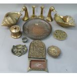 A pair of brass shell shaped vases, a pair of duck book ends, a pair of brass candlesticks on square