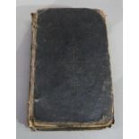 The Book of Common Prayer, printed by Thomas Baskett 1748, the leather bindings front cover