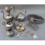 A Victorian four piece silver plated tea and coffee set, engraved and embossed with flowers on