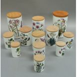 Ten Portmeirion botanic garden storage jars with wooden lids, various back stamps