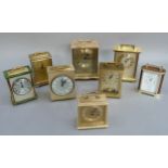 Eight Mantel clocks mainly brass cased, some carriage style, including clocks by London Clock
