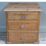 A Victorian pine chest of three short graduated drawers, 68cm wide x 68cm high