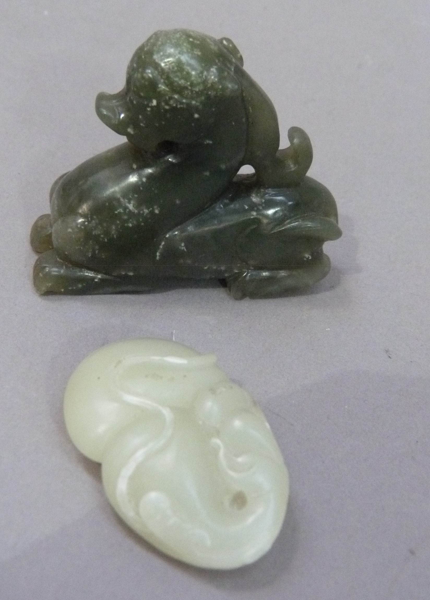 Two jadeite carvings of a dragon and an insect sitting upon a peach, dragon 6cm x 5.5cm, insect - Image 2 of 4