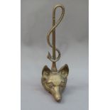 A brass fox mask and whip door porter, 40cm high