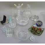 A quantity of decorative glass ware including water carafe and beaker, glass cube, two paperweights,