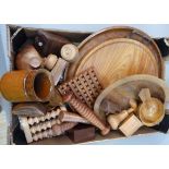 A selection of treen including, trays, bowls of various sizes, nut crack, trinket boxes, puzzle box,
