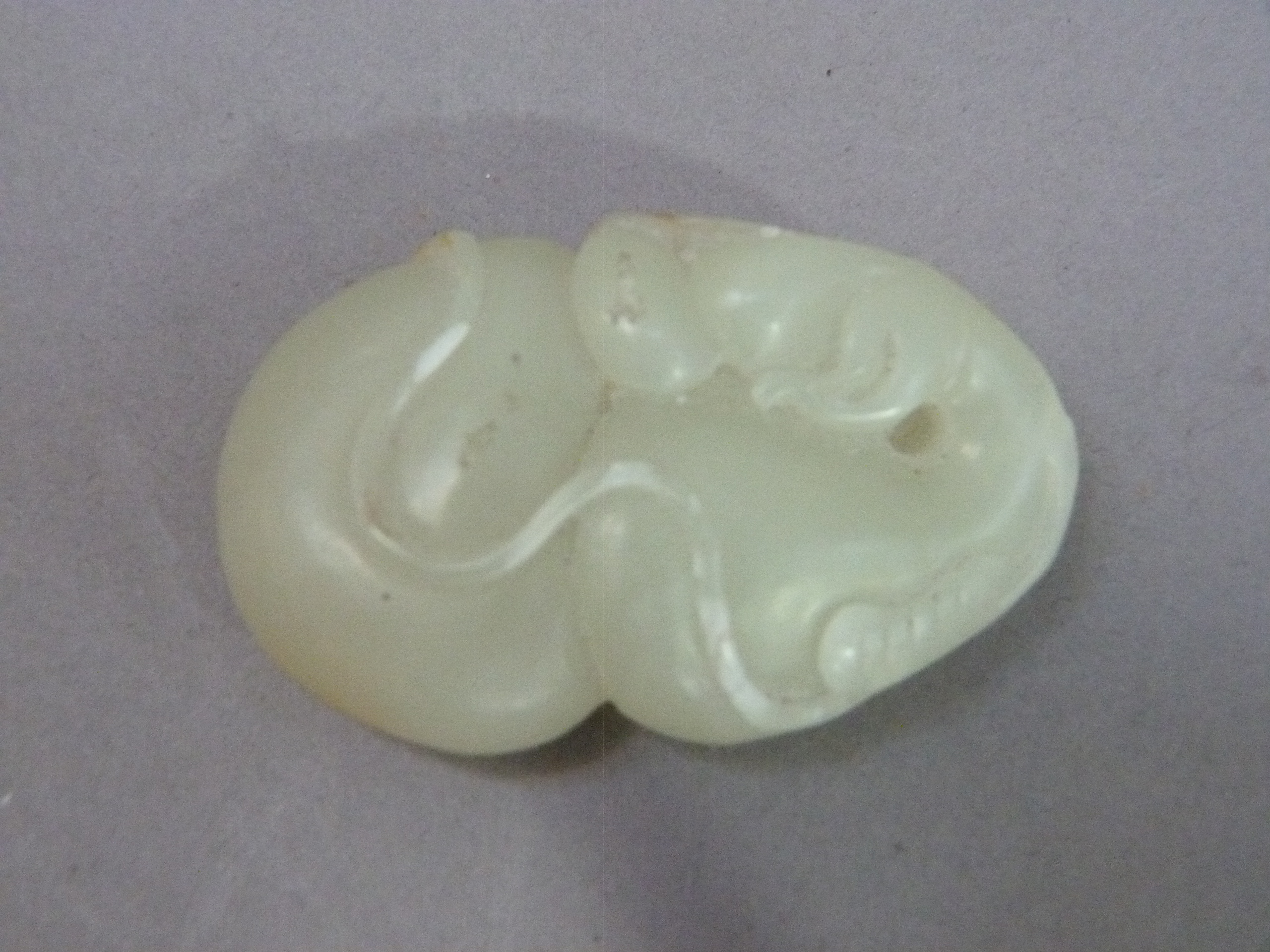 Two jadeite carvings of a dragon and an insect sitting upon a peach, dragon 6cm x 5.5cm, insect - Image 3 of 4