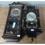 A Seiko fifteen day wall clock in stained wooden case; a thirty-one day wall clock in stained oak