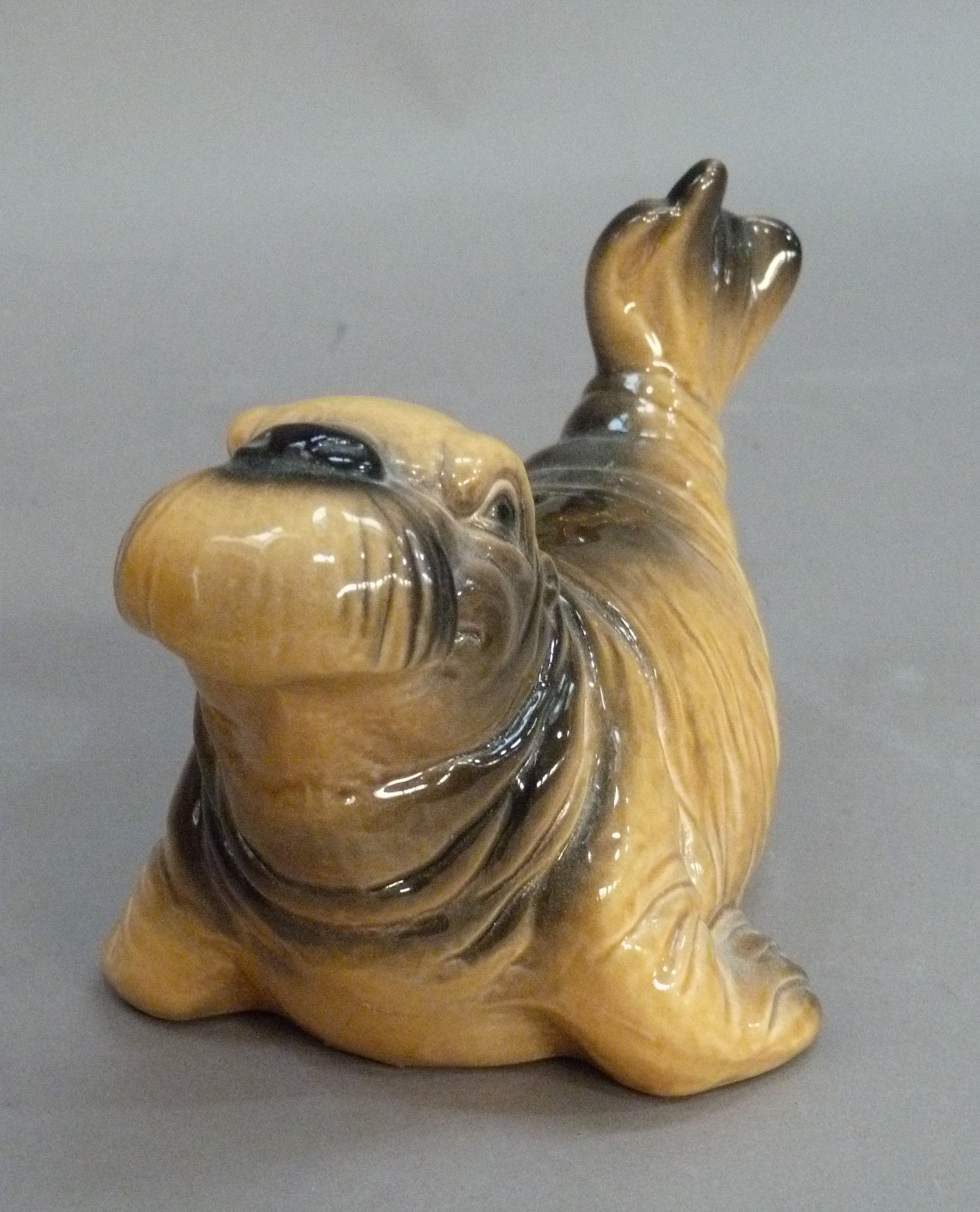 A Goebel pottery walrus money bank, 21cm wide, printed mark in blue numbered 087/1 together with