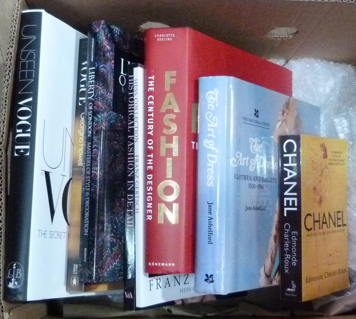 A quantity of books on fashion, including Vogue, The Art of Dress, Chanel etc