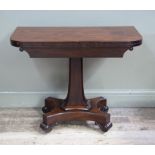 A Victorian mahogany card table