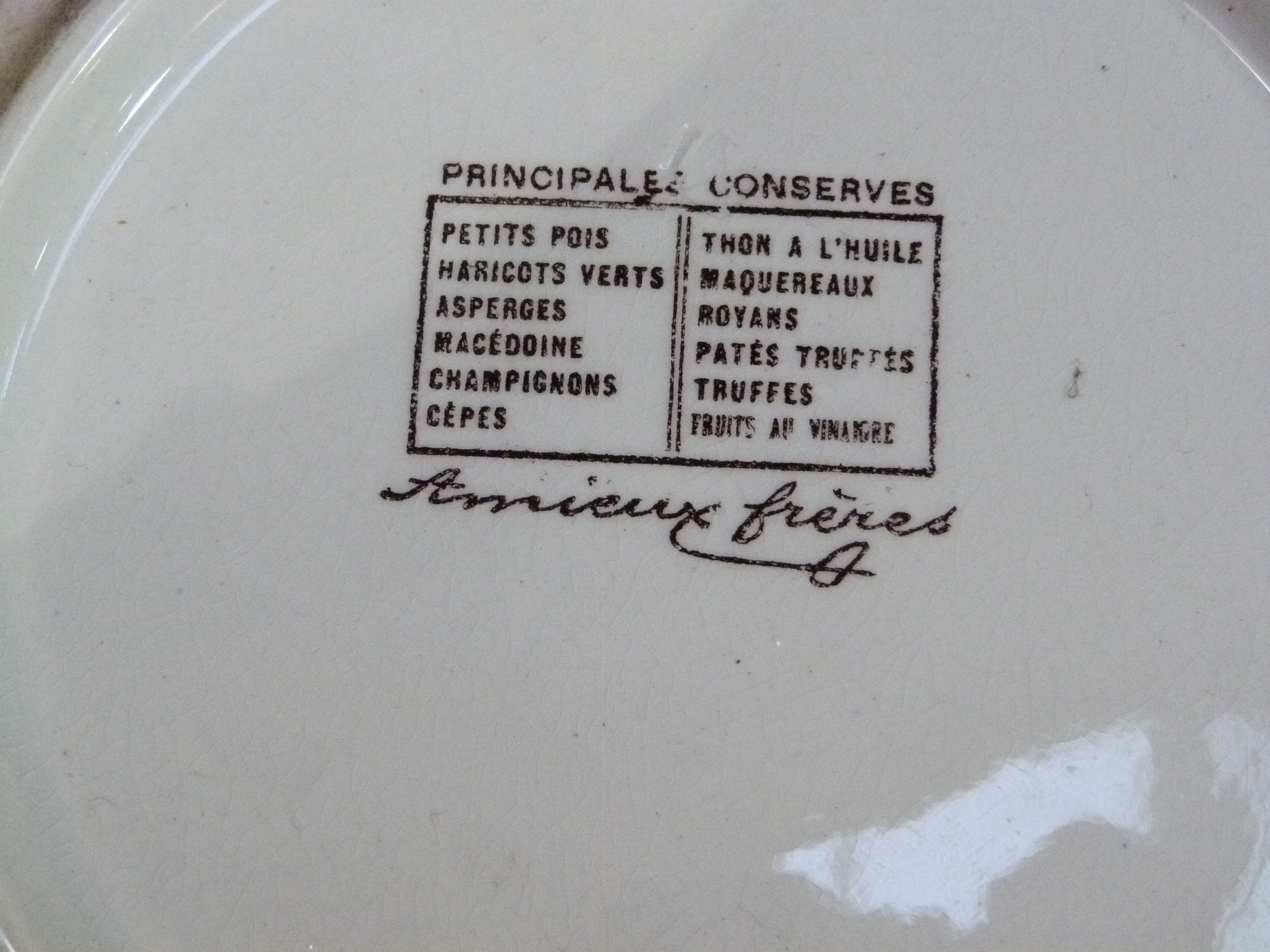 A French sardine dish by Amieux Freres the circular plate moulded with four sardines printed and - Image 2 of 2