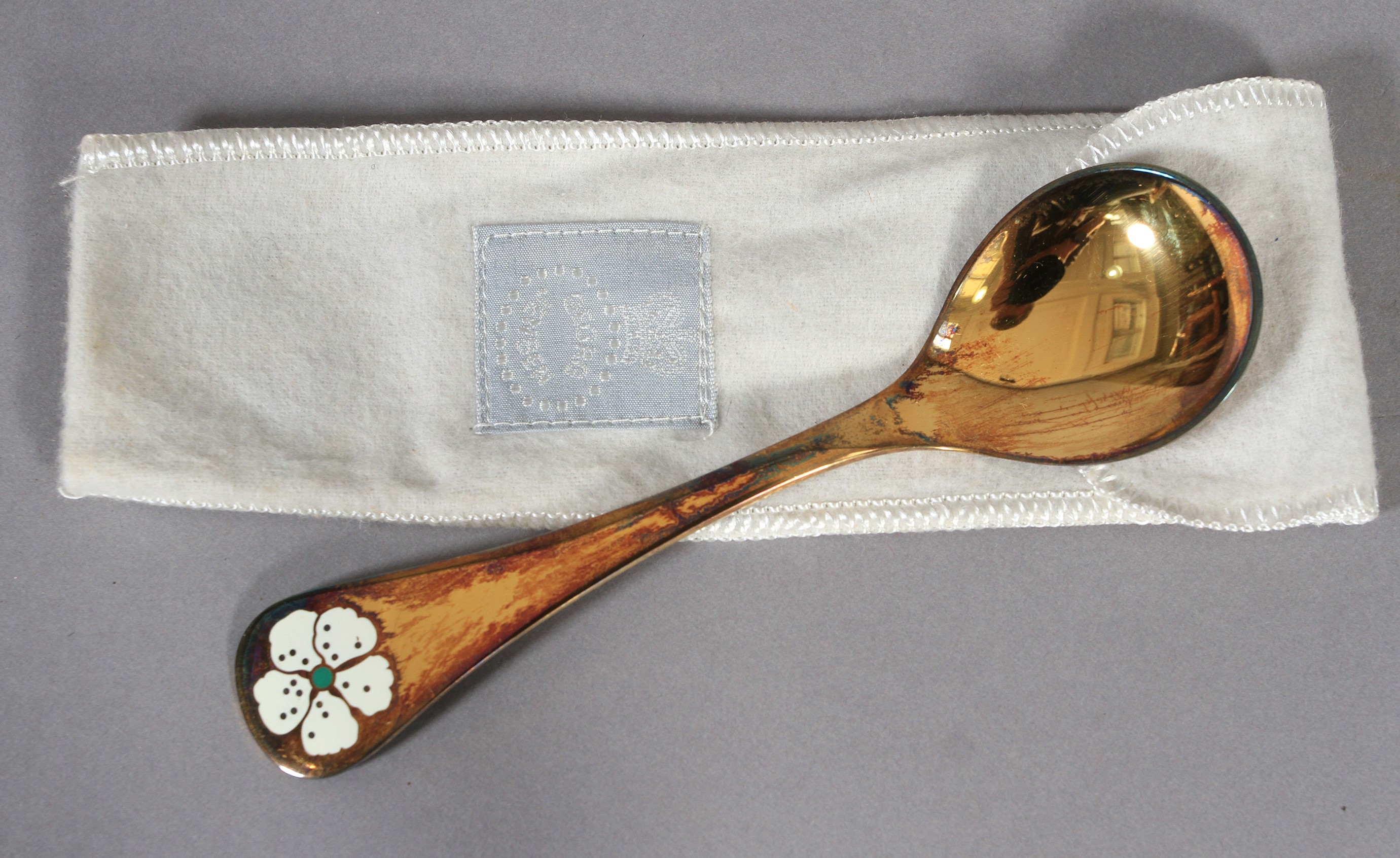 Georg Jensen, a .925 silver gilt year spoon for 1971 with cherry blossom motif in white and green - Image 2 of 2