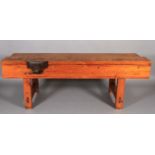 A pine work bench, 227cm long x 70cm wide x 83cm high